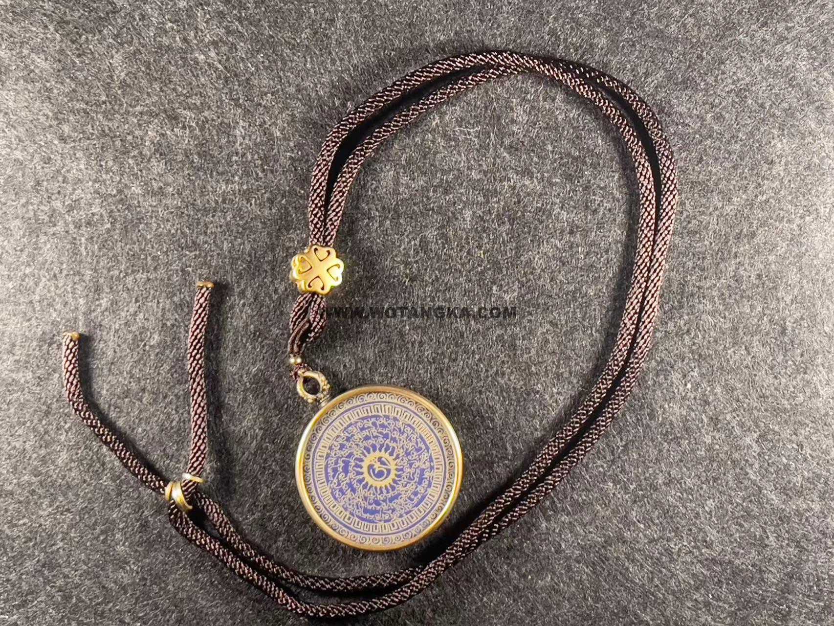 编号118-8117574：蓝金小唐卡-六字大明咒（圆形·直径3.5CM左右）